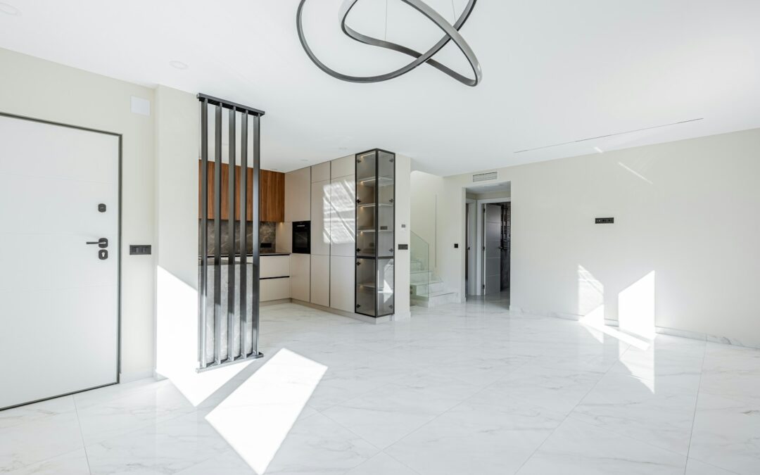 Modern living room with open kitchen and minimalist decor